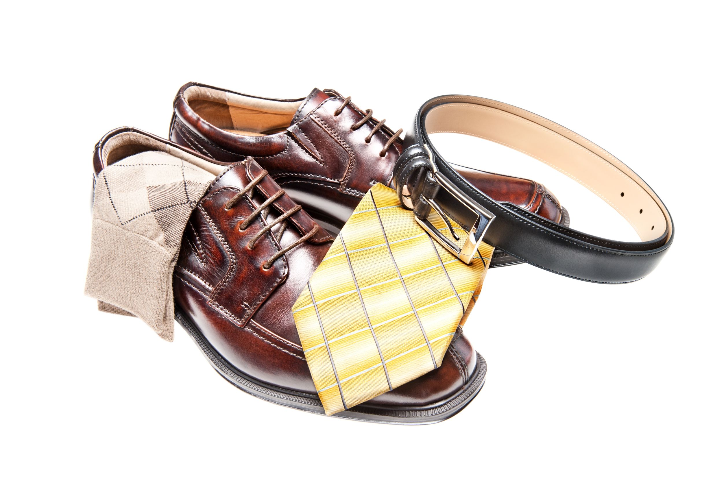 12460999 - brown leather dress shoes with argyle socks and a black belt